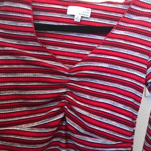 long sleeve red and grey striped V-neck.